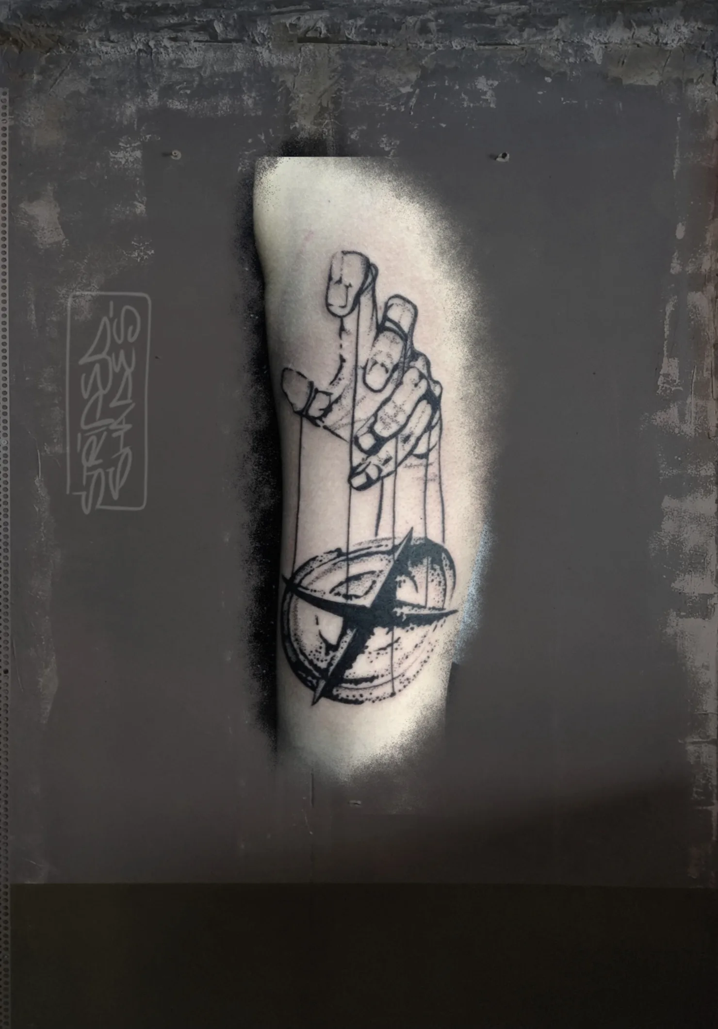 Puppeteer Hand Pulling Strings on a Compass, by striped_shades